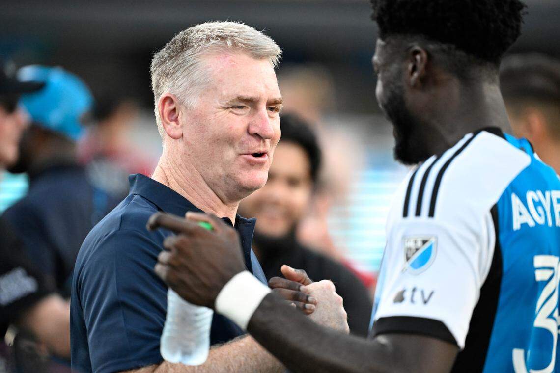 Charlotte FC head coach Dean Smith and forward Patrick Agyemang (33) celebrate after a game. Charlotte FC no longer has Agyemang, who now plays in England, but it is still winning.