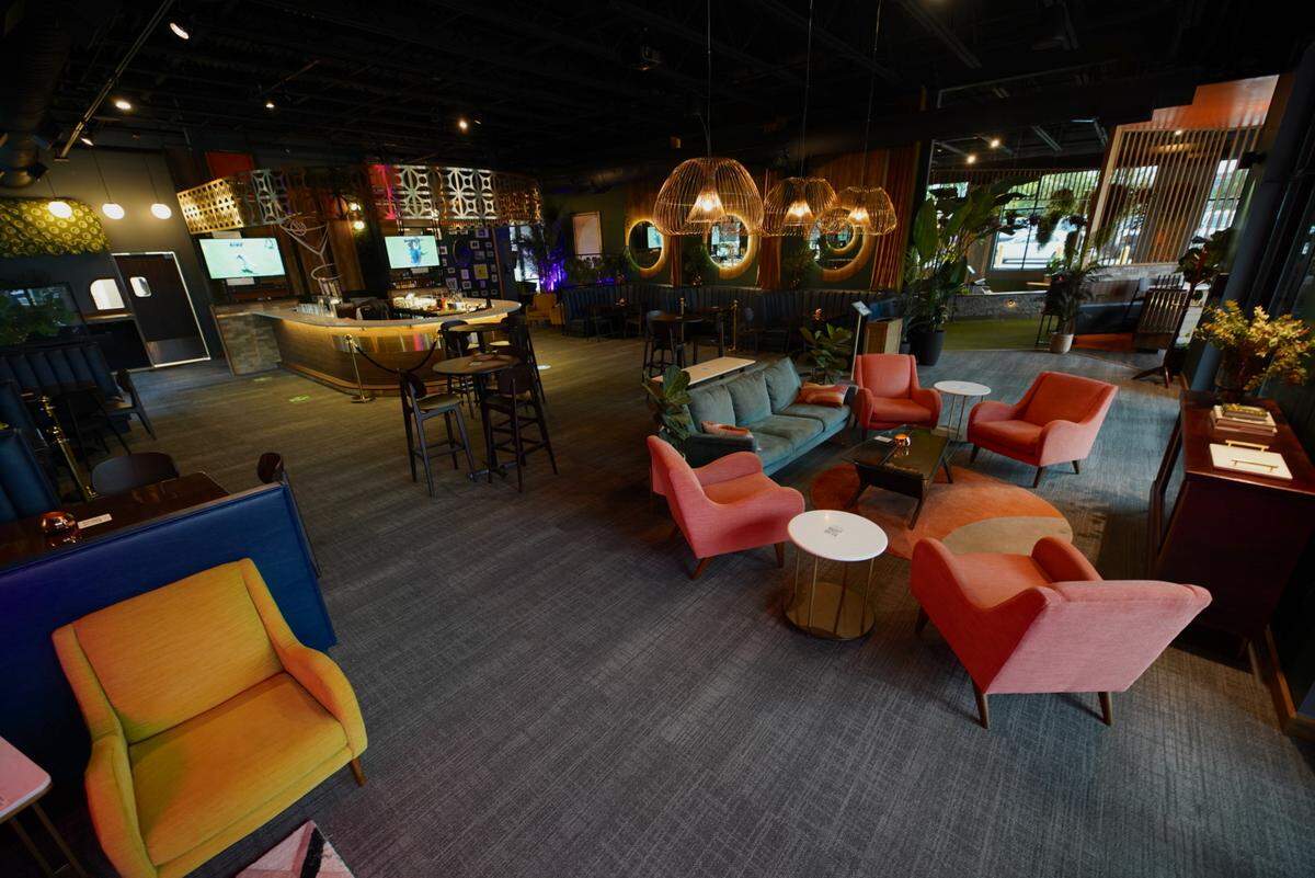 Stroke, a ’70s themed lounge and mini golf experience, is now open in Plaza Midwood.