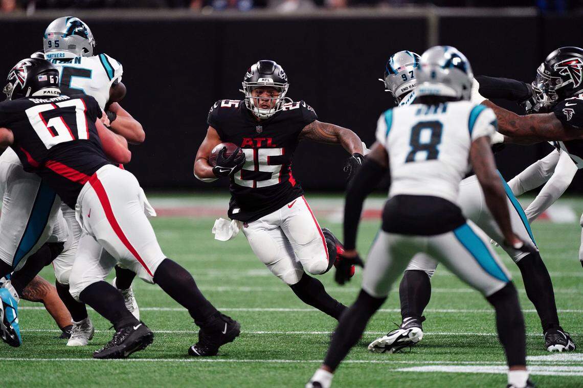 Atlanta Falcons running back Tyler Allgeier (25) runs with the ball during the first half of an NFL football game against the Carolina Panthers Sunday, Oct. 30, 2022, in Atlanta. (AP Photo/John Bazemore)
