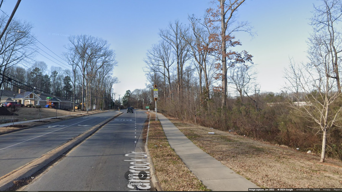 The car was found at the bottom of an embankment in the 4800 block of Shamrock Drive in northeast Charlotte, CMPD said.