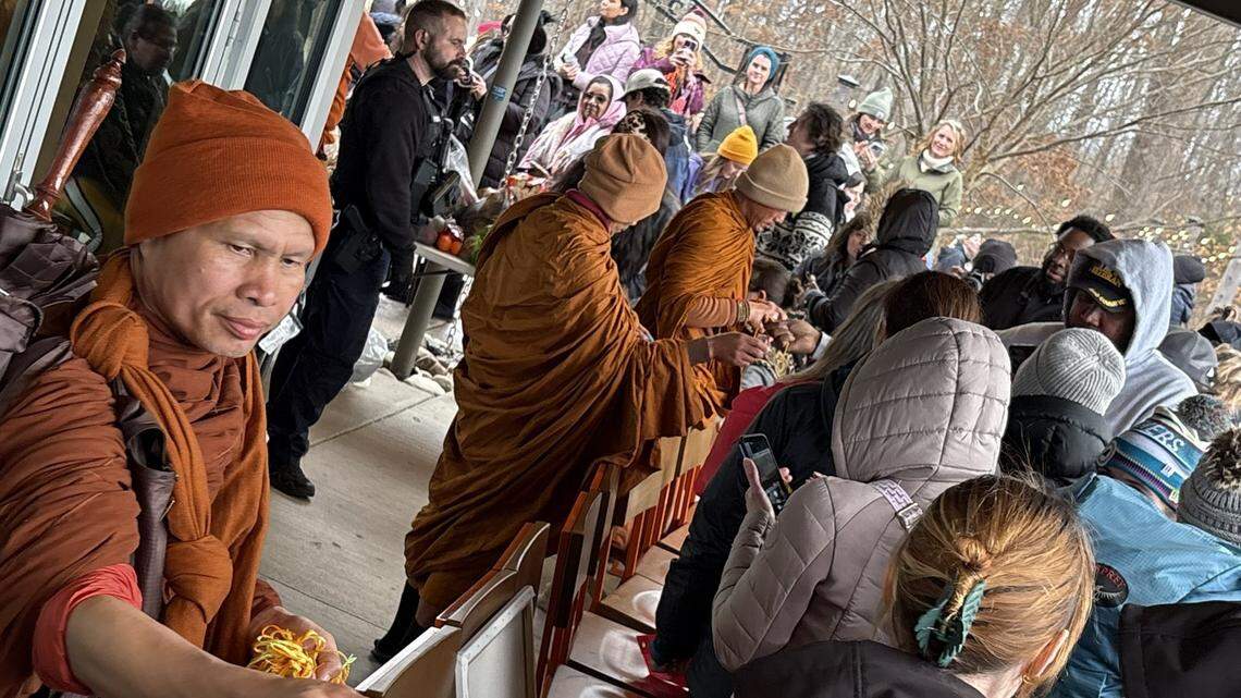 Crowds embrace Walk for Peace monks in rainy Rock Hill ahead of Charlotte stop