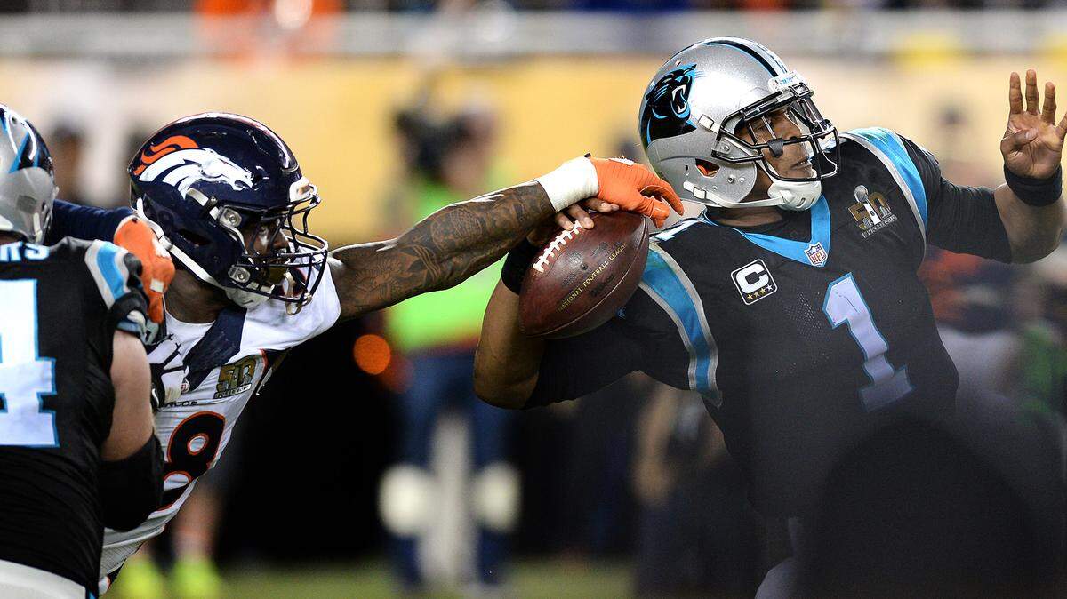 Denver Broncos linebacker Von Miller knocks the ball out of Carolina Panthers quarterback Cam Newton’s hand during the fourth quarter of Super Bowl 50 in 2016. Miller strip-sacked Newton twice in the game, beating right tackle Mike Remmers both times as Denver won, 24-10. Remmers will start at tackle for Kansas City Sunday.