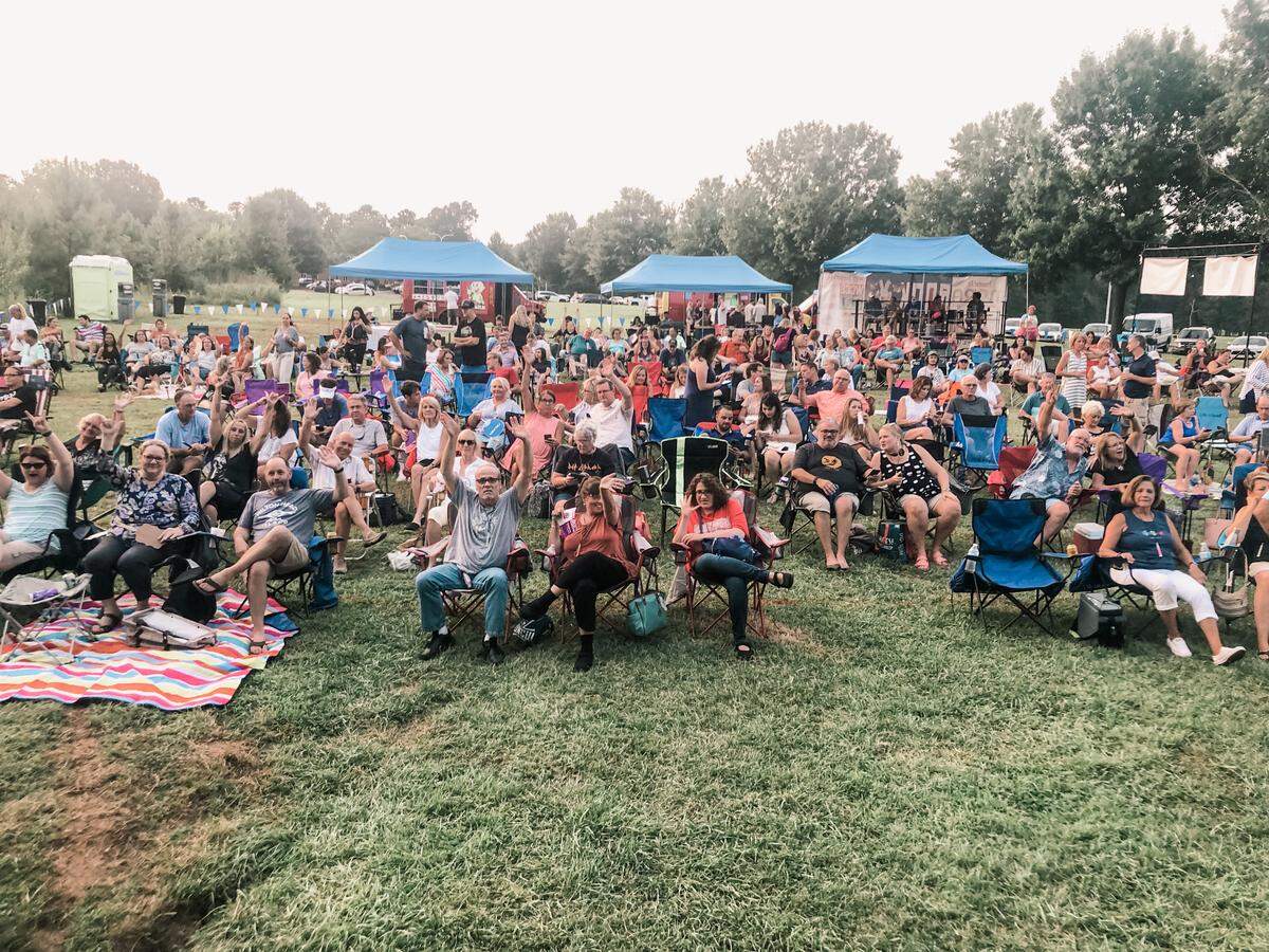 Actor’s Theatre of Charlotte converted a field off of Monroe Road into an outdoor theater during COVID-19. Shown above is the audience from a recent performance of “Rock of Ages.”