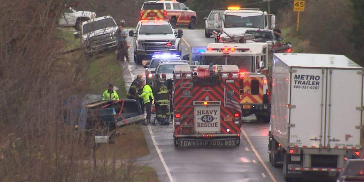 Iredell County authorities respond to the scene where one person in a vehicle was killed by a falling tree Sunday during powerful storms that ripped through the area.