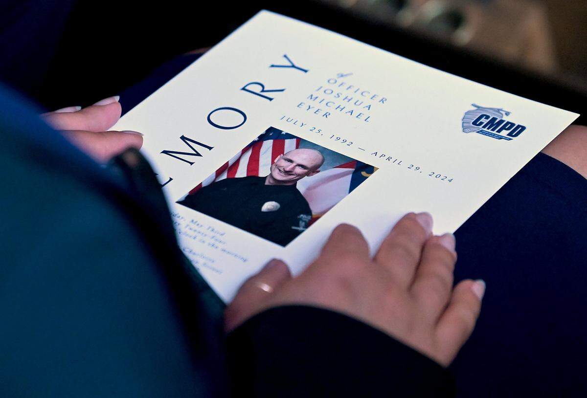 Mourners gather at First Baptist Church on Friday, May 3, 2024 to honor slain Charlotte-Mecklenburg Police Officer Joshua Eyer. Officer Eyer died from wounds sustained during a standoff with a gunman on Monday, April 29th. Three other law enforcement officers were also killed in the shootout.