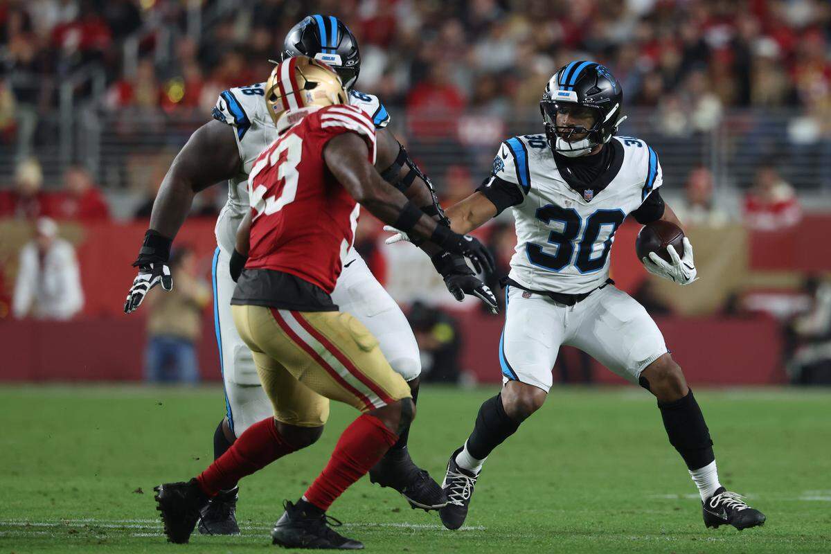 Chuba Hubbard (30) of the Carolina Panthers runs with the ball in the third quarter against the San Francisco 49ers on Monday at Levi's Stadium.
