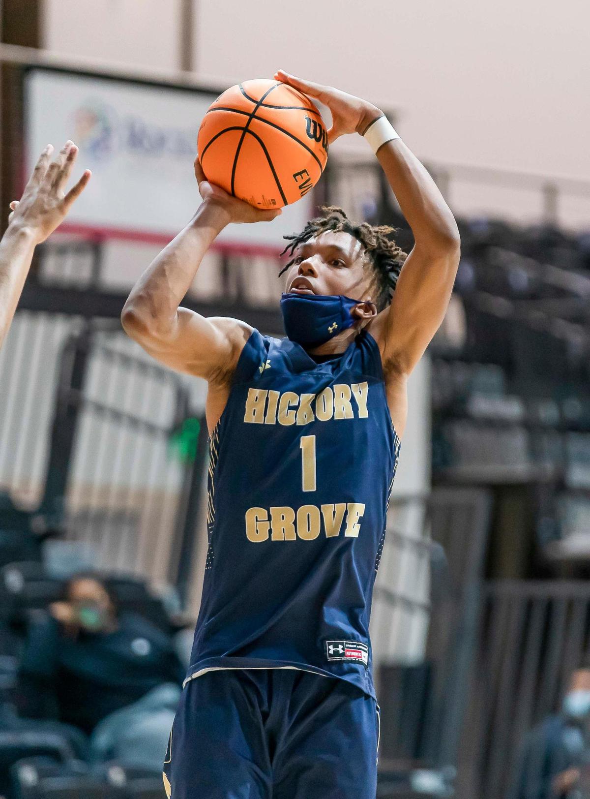 Hickory Grove’s DJ Cuttion (1) pulls up for the 3-point shot at the Phenom Holiday Classic Wednesday December 23, 2020.