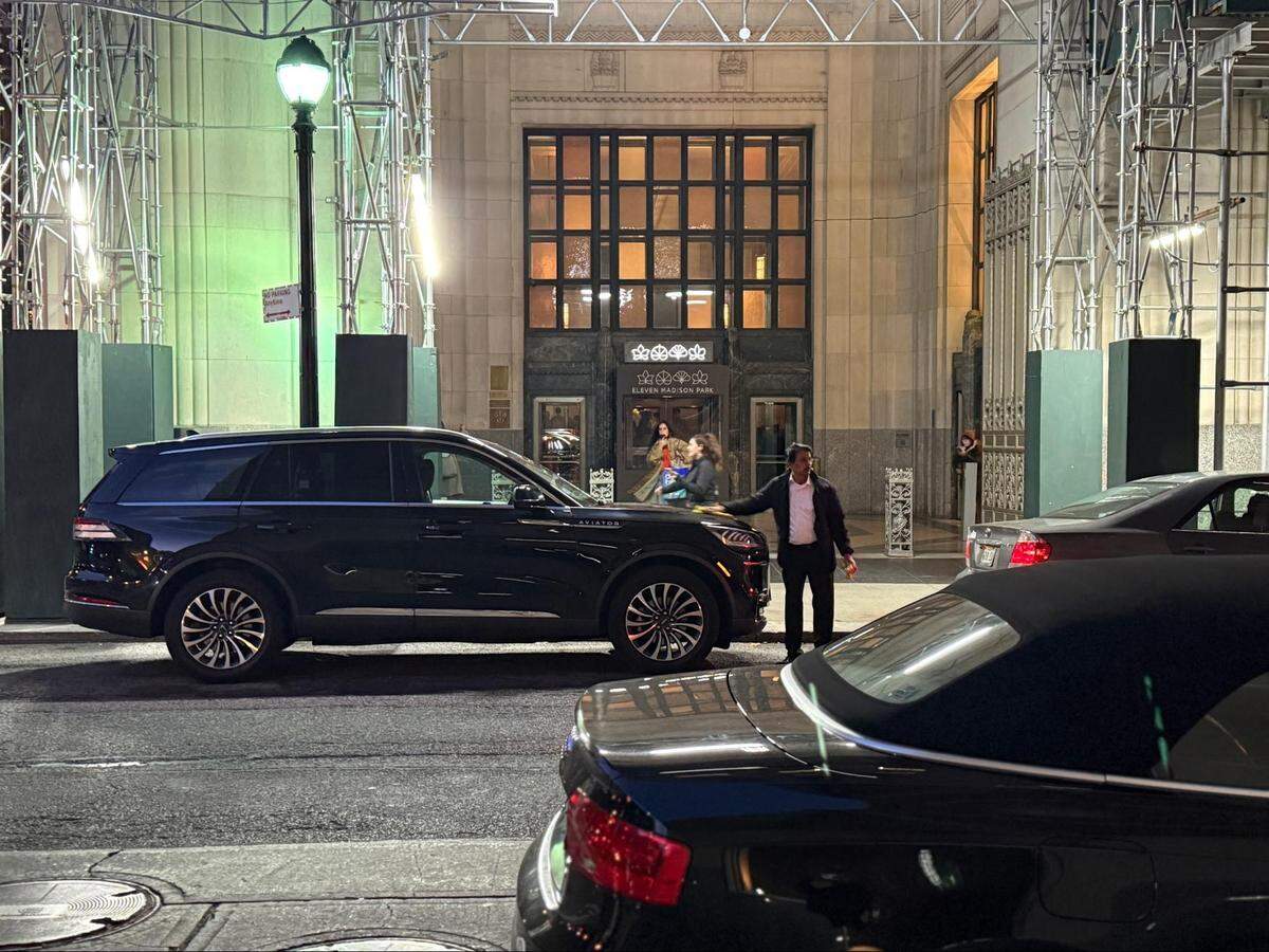 Guests arrive outside Eleven Madison Park in New York City.
