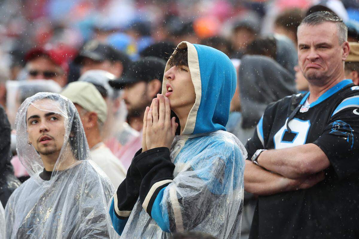 Carolina Panthers fans endure the rain as the team battles the Tampa Bay Buccaneers at Raymond James Stadium in Tampa, FL. on Saturday, January 3, 2026. The Buccaneers defeated the Panthers 16-14.
