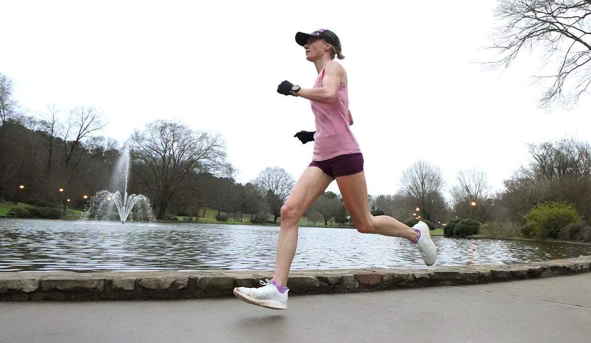 Paula Pridgen runs around the lake at Freedom Park in Charlotte, NC on Thursday, February 19, 2020. Pridgen, 33, is the only Charlottean headed to the 2020 U.S. Olympic Marathon Team Trials in Atlanta, GA on Saturday, February 29, 2020.                                