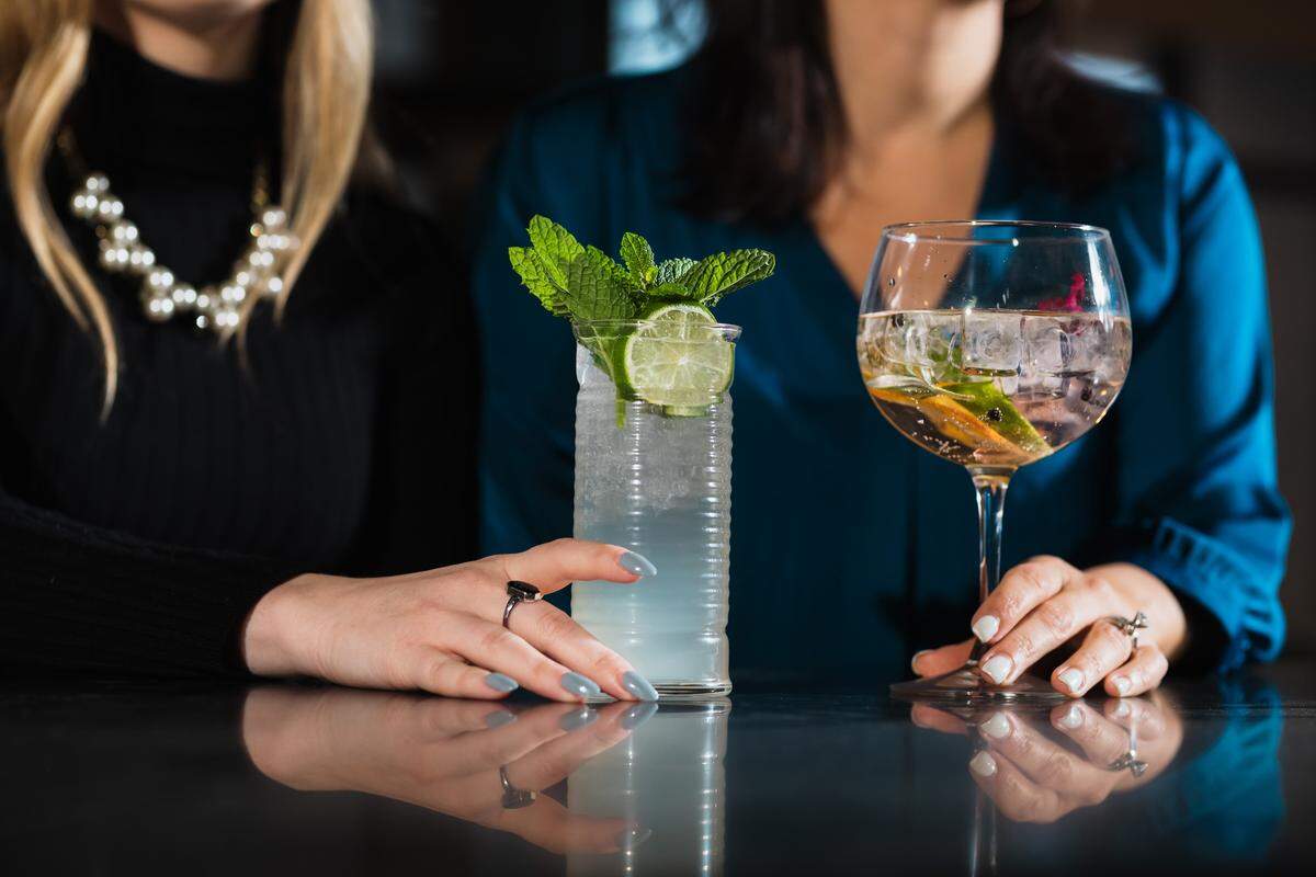 A mojito and pink gin and tonic at Cordial.