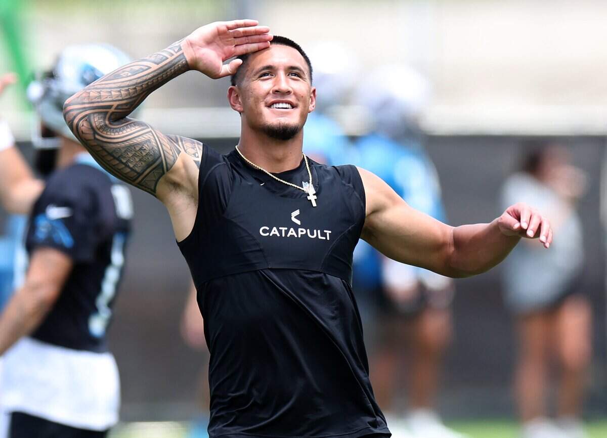 Carolina Panthers wide receiver Tetairoa McMillan jokes around with quarterback Bryce Young during a mandatory minicamp practice on Wednesday, June 10, 2026.