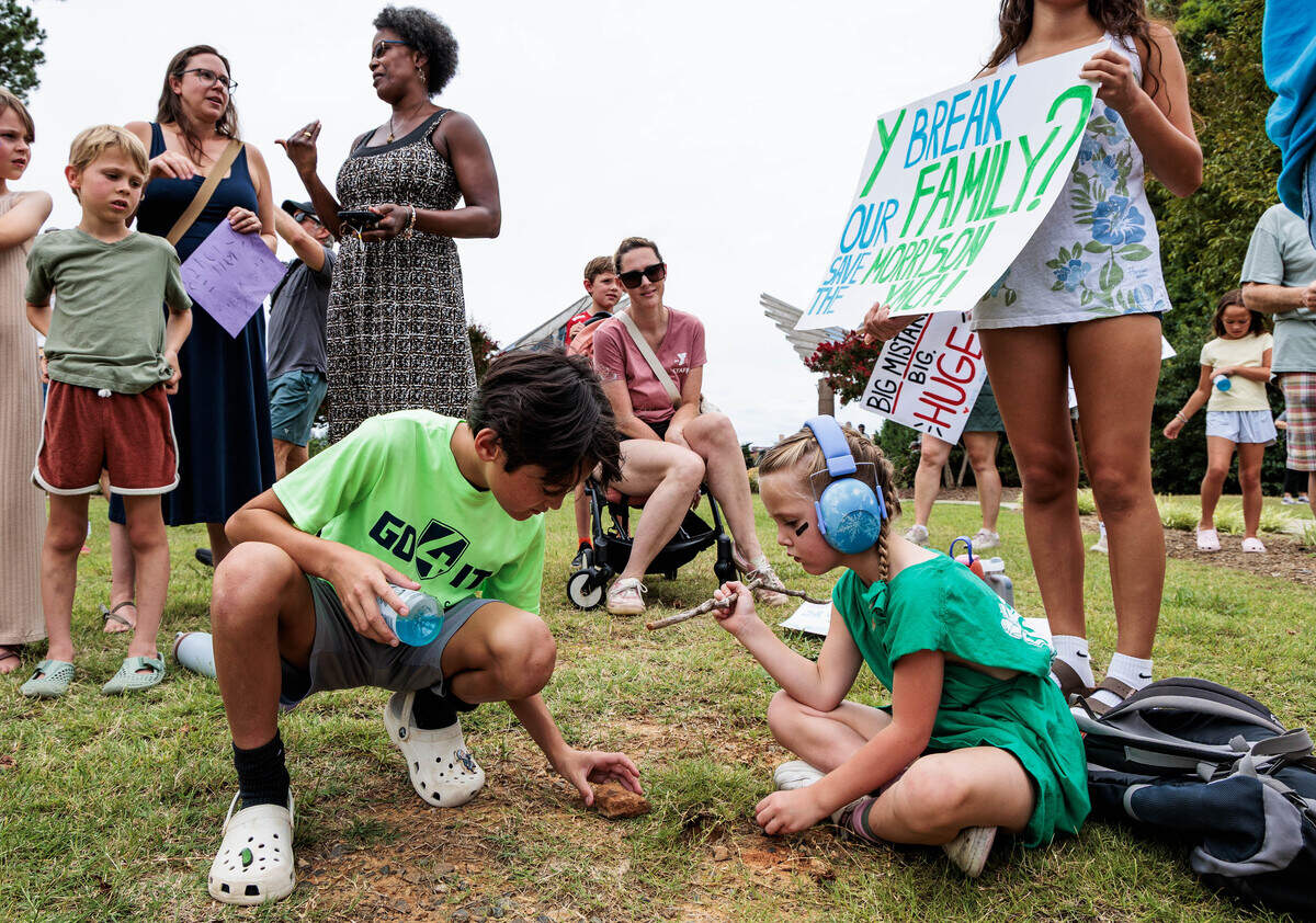 Children play amidst the Morrison Family YMCA protest in Ballantyne on Sunday, July 12, 2026.