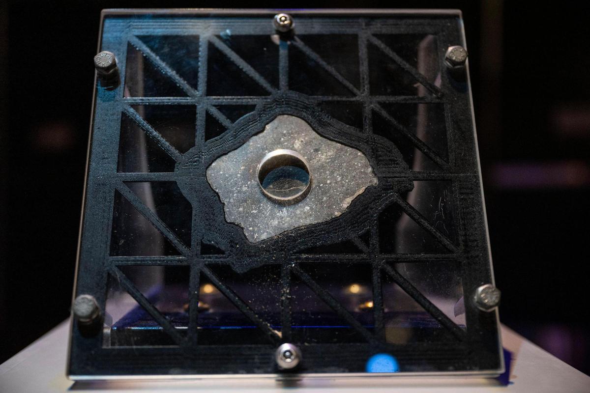 A slice of lunar meteorite that visitors can touch is on display in “Apollo” When We Went to the Moon” at Discovery Place Science in Charlotte.