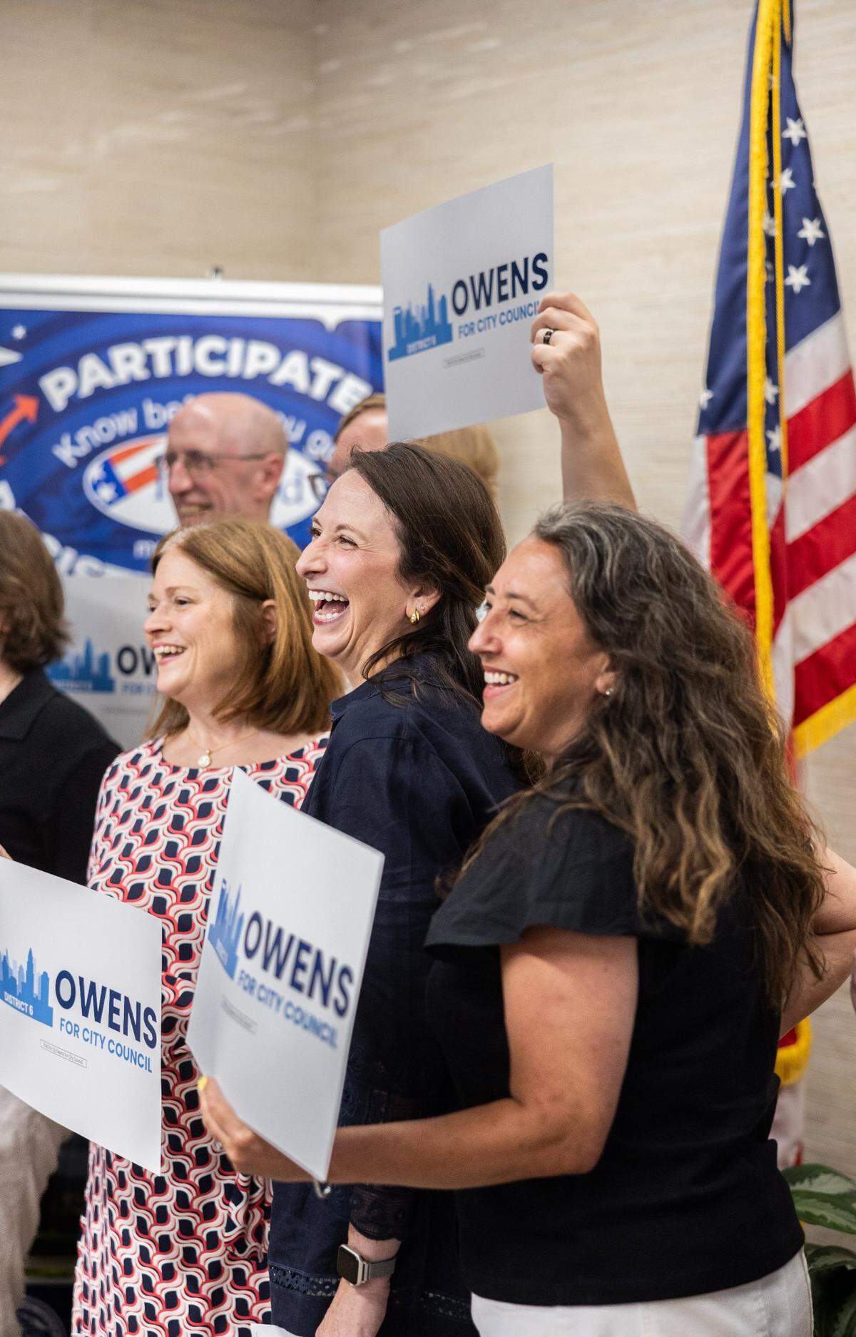 Kimberly Owens beams while taking a photo with supporters after she filed as a candidate for Charlotte City Council District 6 during the first day of candidate filing for the 2025 election in Mecklenburg County Board of Elections in Charlotte, N.C., on Monday, July 7, 2025.