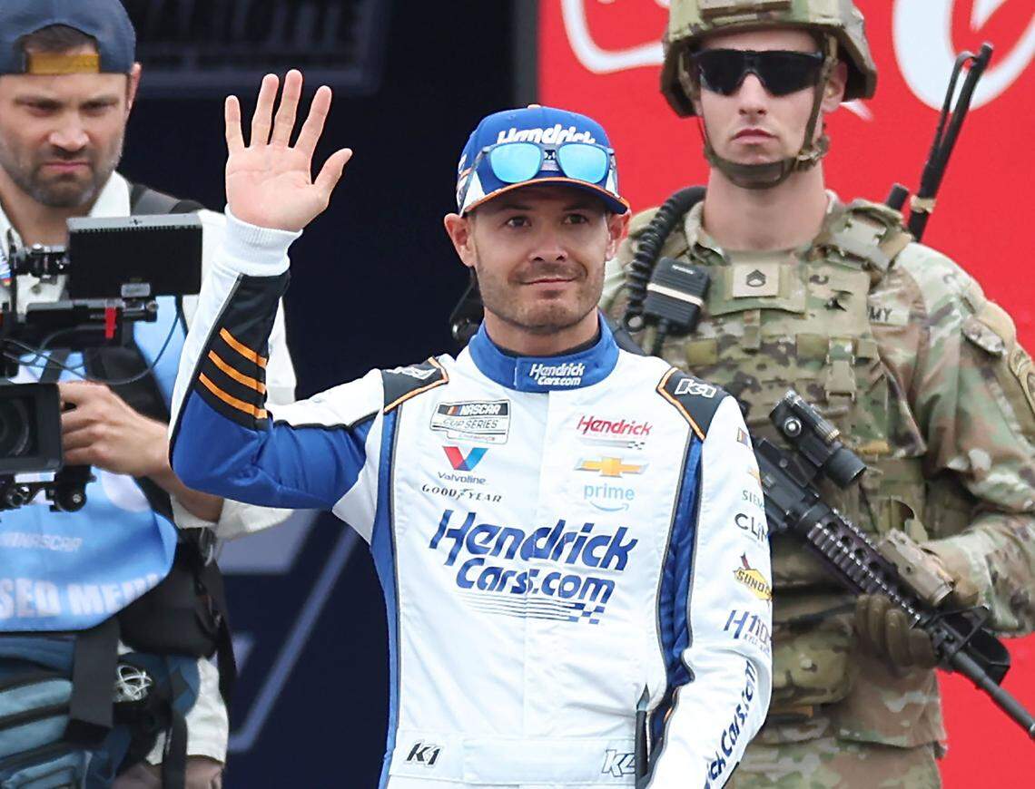 NASCAR Cup Series driver Kyle Larson waves to the fans during driver introductions at Charlotte Motor Speedway in Concord, NC on Sunday, May 25, 2025. Larson raced in the Indianapolis 500 and then the Coca-Cola 600.