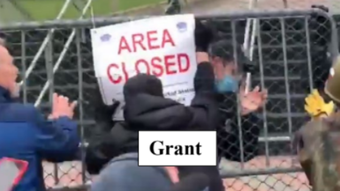 Cary resident James Grant storms a security fence outside the U.S. Capitol on Jan. 6, 2021, as police try to keep him and other rioters out. A federal judge in Washington, D.C., found Grant guilty of multiple felonies and misdemeanors on Feb. 2, 2024. Grant is among 1,500 people who were pardoned by President Trump in connecting with the Jan. 6 insurrection.