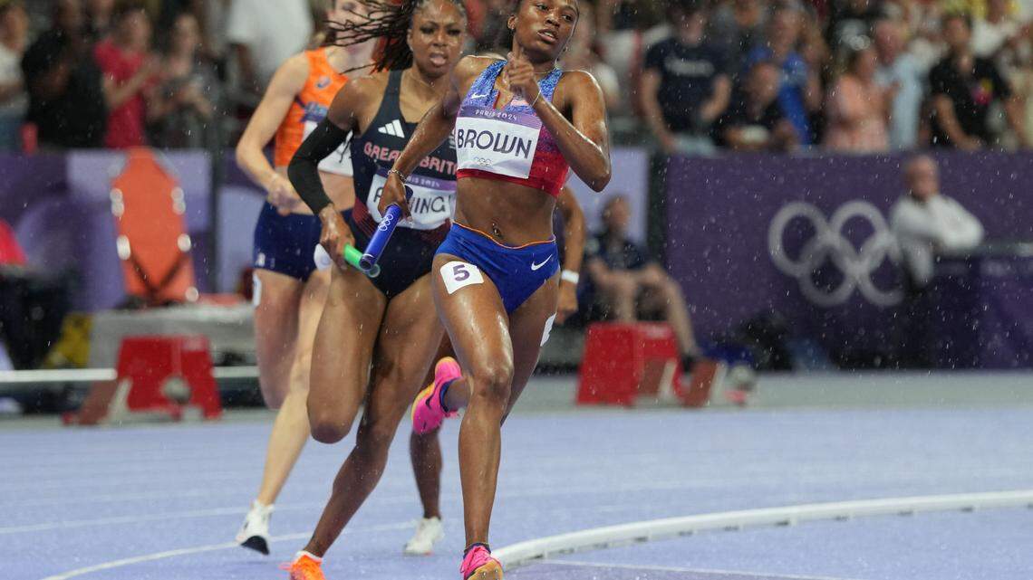 Aug 3, 2024; Paris, FRANCE; Kaylyn Brown (USA) runs ahead of Femke Bol (NED) and Amber Anning (GBR) in the mixed 4x400m relay final during the Paris 2024 Olympic Summer Games at Stade de France. Mandatory Credit: Kirby Lee-USA TODAY Sports