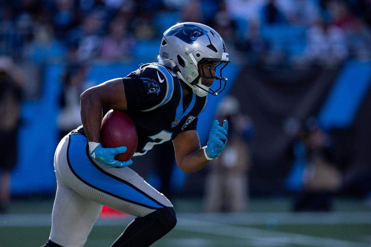 Nov 3, 2024; Charlotte, North Carolina, USA; Carolina Panthers running back Raheem Blackshear (3) runs back a punt against the New Orleans Saints during the third quarter at Bank of America Stadium. Mandatory Credit: Scott Kinser-Imagn Images