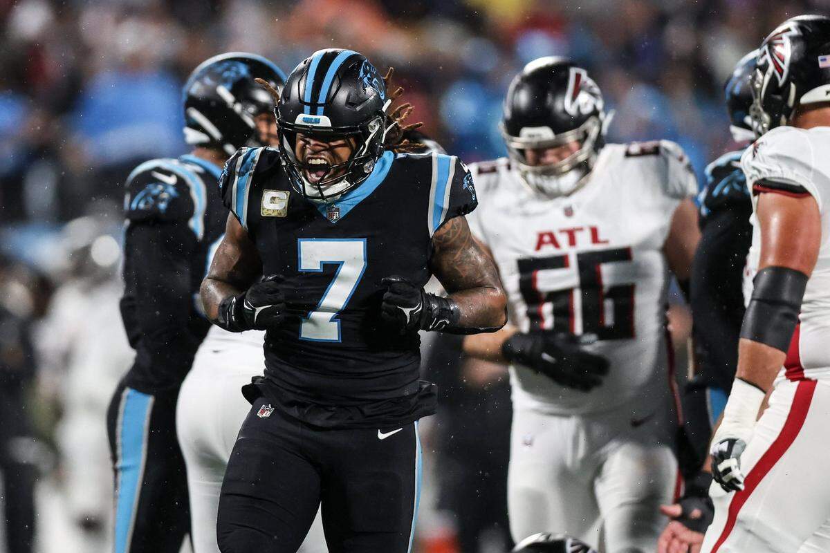 Carolina Panthers linebacker Shaq Thompson celebrates after a tackle against the Atlanta Falcons on Thursday, November 10, 2022.