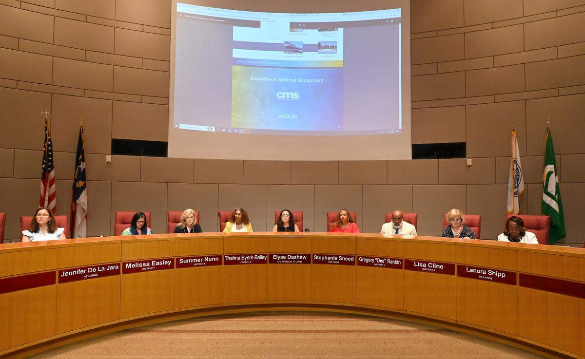 Charlotte Mecklenburg school board members listen to speakers during the board’s meeting at the Charlotte-Mecklenburg Government Center on Tuesday, August 22, 2023. CMS is one of the first to pass policies to comply with Senate Bill 49.