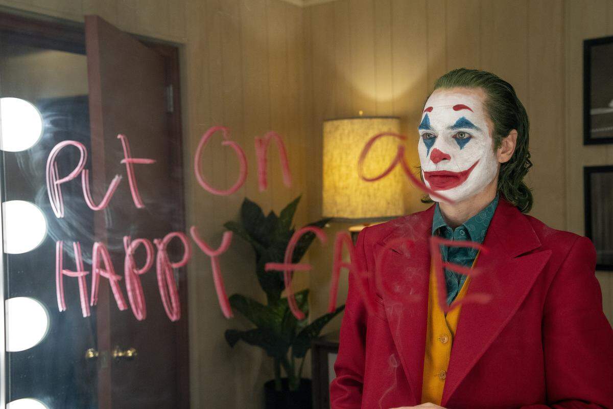 This image released by Warner Bros. Pictures shows Joaquin Phoenix in a scene from “Joker,” in theaters on Oct. 4.  (Niko Tavernise/Warner Bros. Pictures via AP)