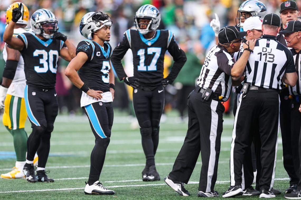 Carolina Panthers quarterback Bryce Young (9) waits for a call from the referees about time left during the game against the Packers at Bank of America Stadium on Sunday, December 24, 2023. Ultimately, the Panthers ran out of time to make a play and were defeated by the Pakcers, 33-30.