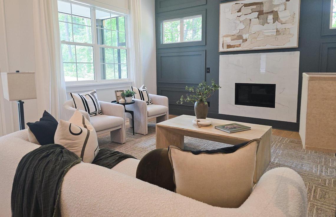 A decorated living room is seen in a new home at The Enclave at Enderly Park, a new subdivision with a high pricepoint.