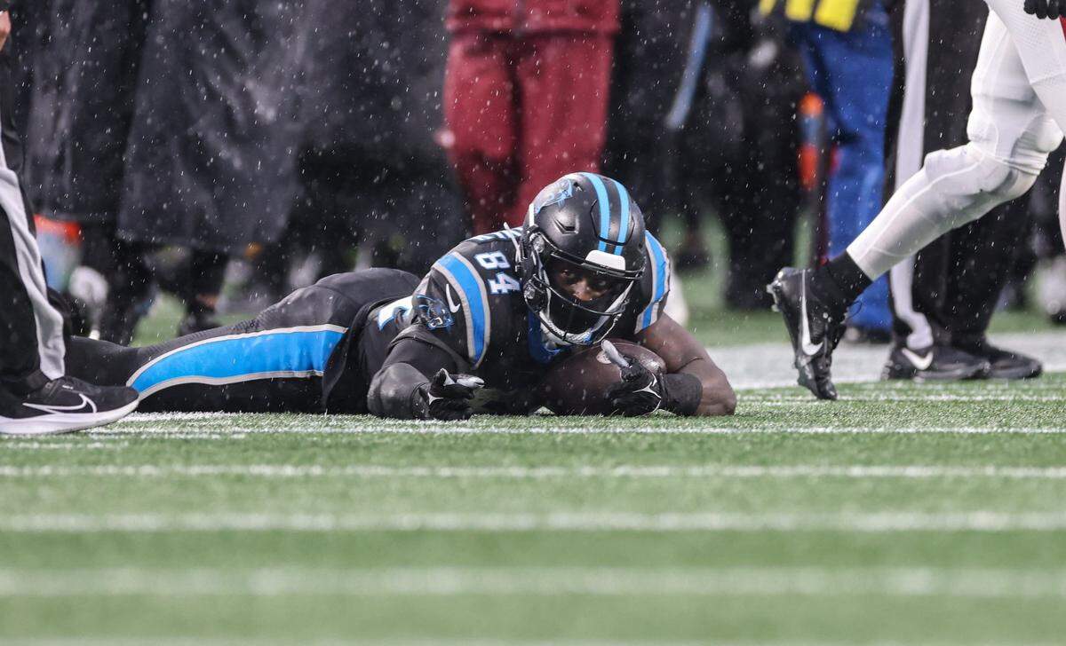 Carolina Panthers tight end Stephen Sullivan points at a camera after completing a pass against the Atlanta Falcons at the Bank of America Stadium in Charlotte, N.C., on Sunday, December 17, 2023.