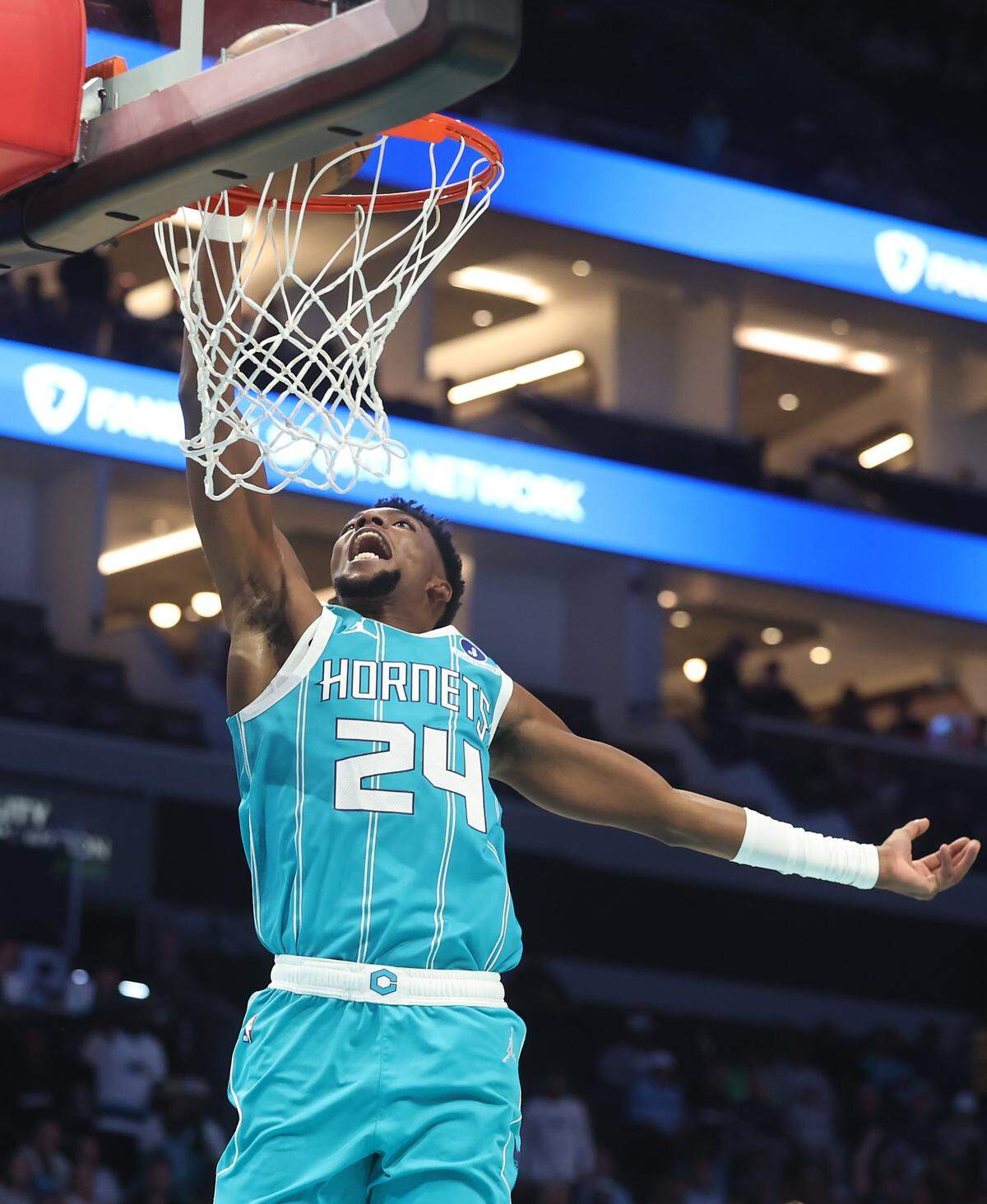 Charlotte Hornets guard Brandon Miller throws down a one-handed dunk during action against the Brooklyn Nets on Wednesday, October 22, 2025 at Spectrum Center in Charlotte, NC.