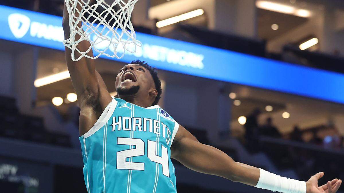 Charlotte Hornets guard Brandon Miller throws down a one-handed dunk during action against the Brooklyn Nets on Wednesday, October 22, 2025 at Spectrum Center in Charlotte, NC.