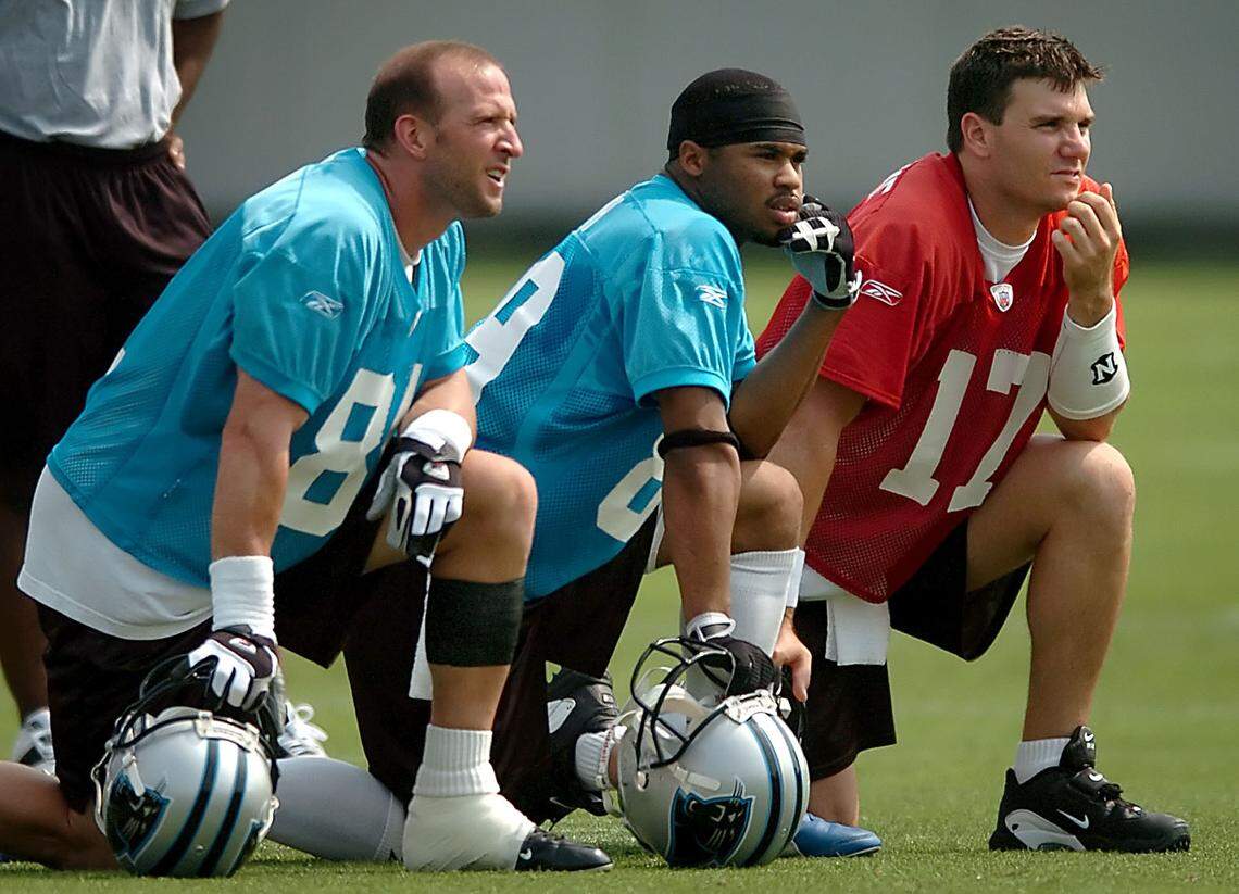 In 2005, Ricky Proehl (far left), Steve Smith (middle) and Jake Delhomme watch their teammates in a practice. Smith has named one of his racehorses X Clown, in honor of a touchdown that Smith scored.