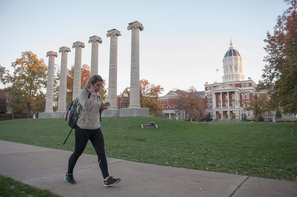 COLUMBIA, MO - NOVEMBER 10: Students walk along on the campus of University of Missouri - Columbia on November 10, 2015 in Columbia, Missouri. The university looks to get things back to normal after the recent protests on campus that lead to the resignation of the school's President and Chancellor on November 9. (Photo by Michael B. Thomas/Getty Images)