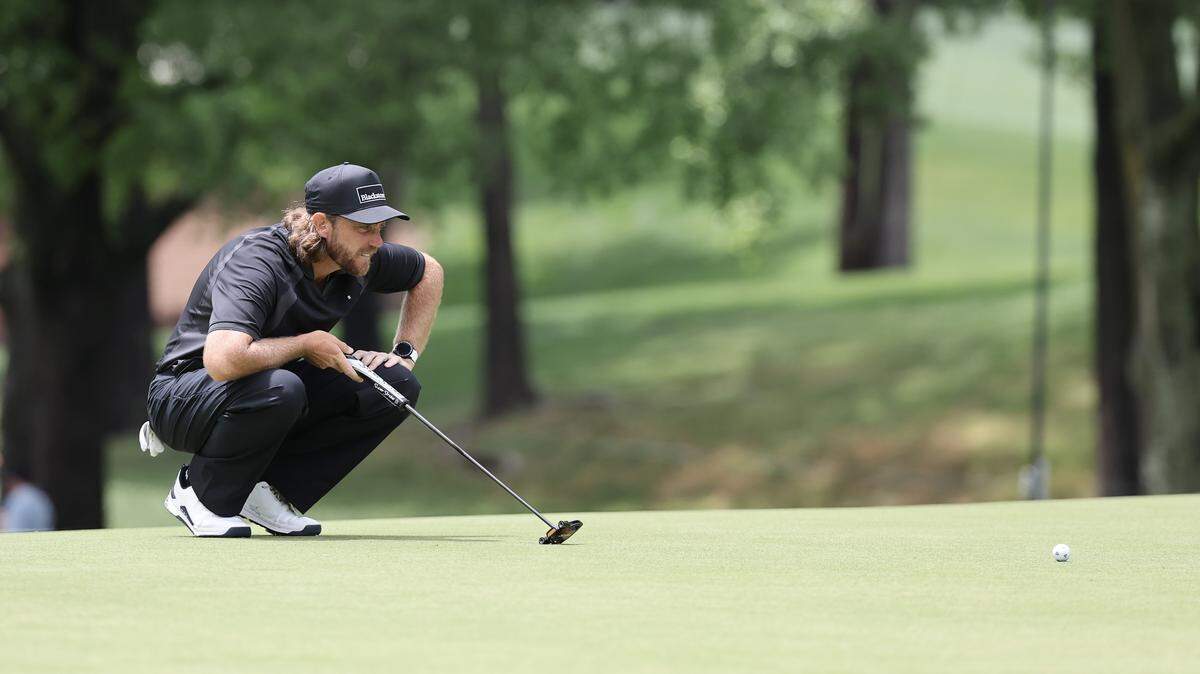 Tommy Fleetwood of Southport, England lines up a putt during the 2026 Truist Championship at the Quail Hollow Club in Charlotte on Thursday, May 7.