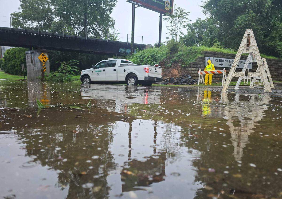 Hawthorne Lane was closed as Tropical Storm Debby drenched Charlotte on Thursday, August 8, 2024.