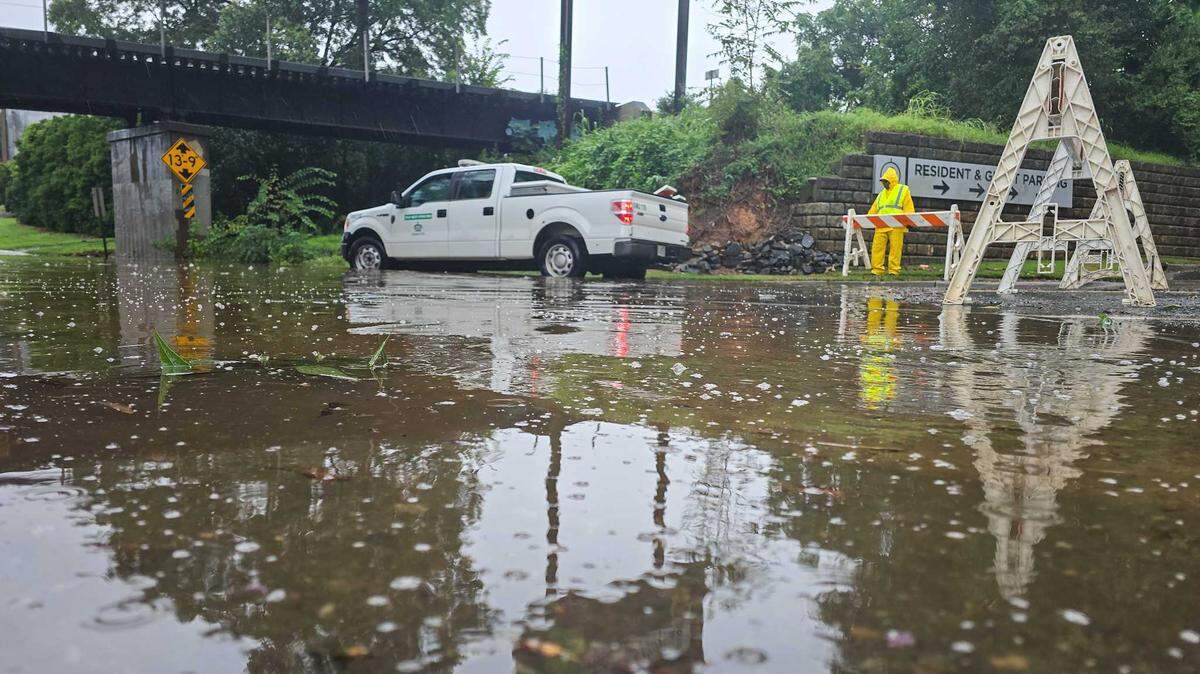 Hawthorne Lane is closed due to water as tropical storm Debby drenched Charlotte on Thursday, August 8, 2024