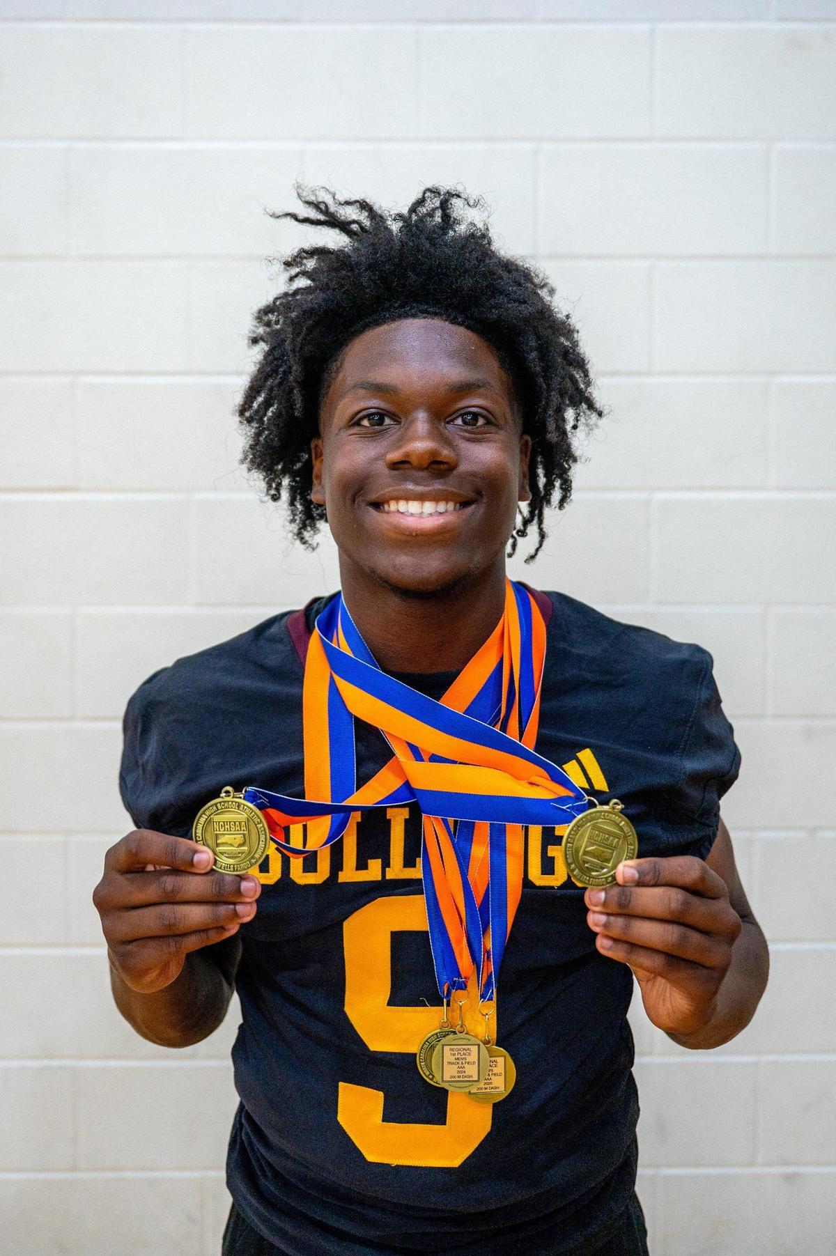 Male athlete of the year Cameron Tucker poses for a portrait at Independence High School in Charlotte, NC Wednesday, June 11, 2025. Tucker was selected as a top athlete for track and football and is a rising senior at JM Robinson High School.