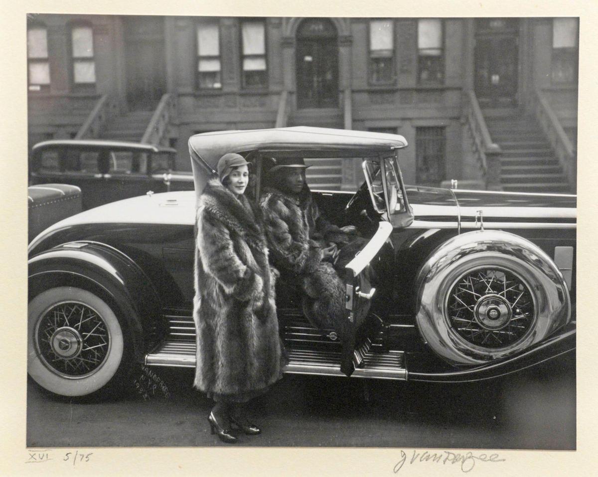 “Couple in Raccoon Coats, Harlem, 1932,” by James VanDerZee, part of the “Vision & Spirit: African American Art exhibit from the Bank of America collection at the Harvey B. Gantt Center for African-American Arts + Culture.