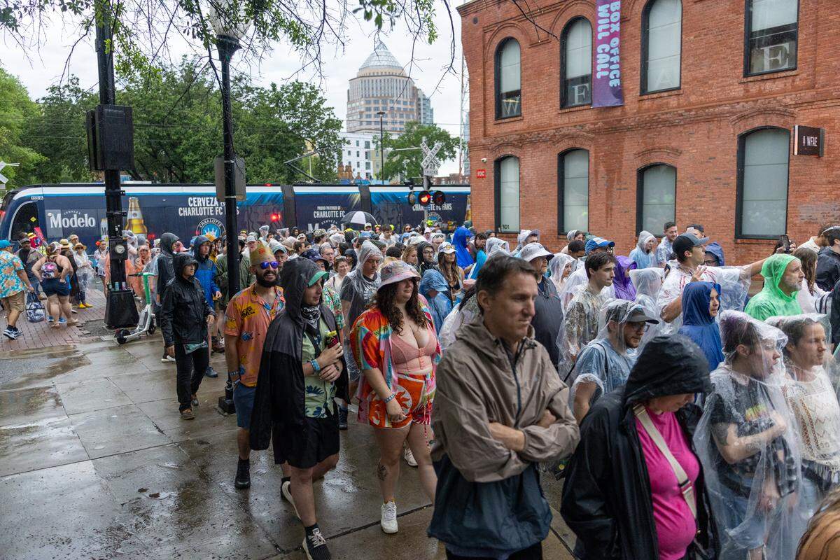 Fans awaiting re-entry after a storm at Lovin’ Life Music Fest.