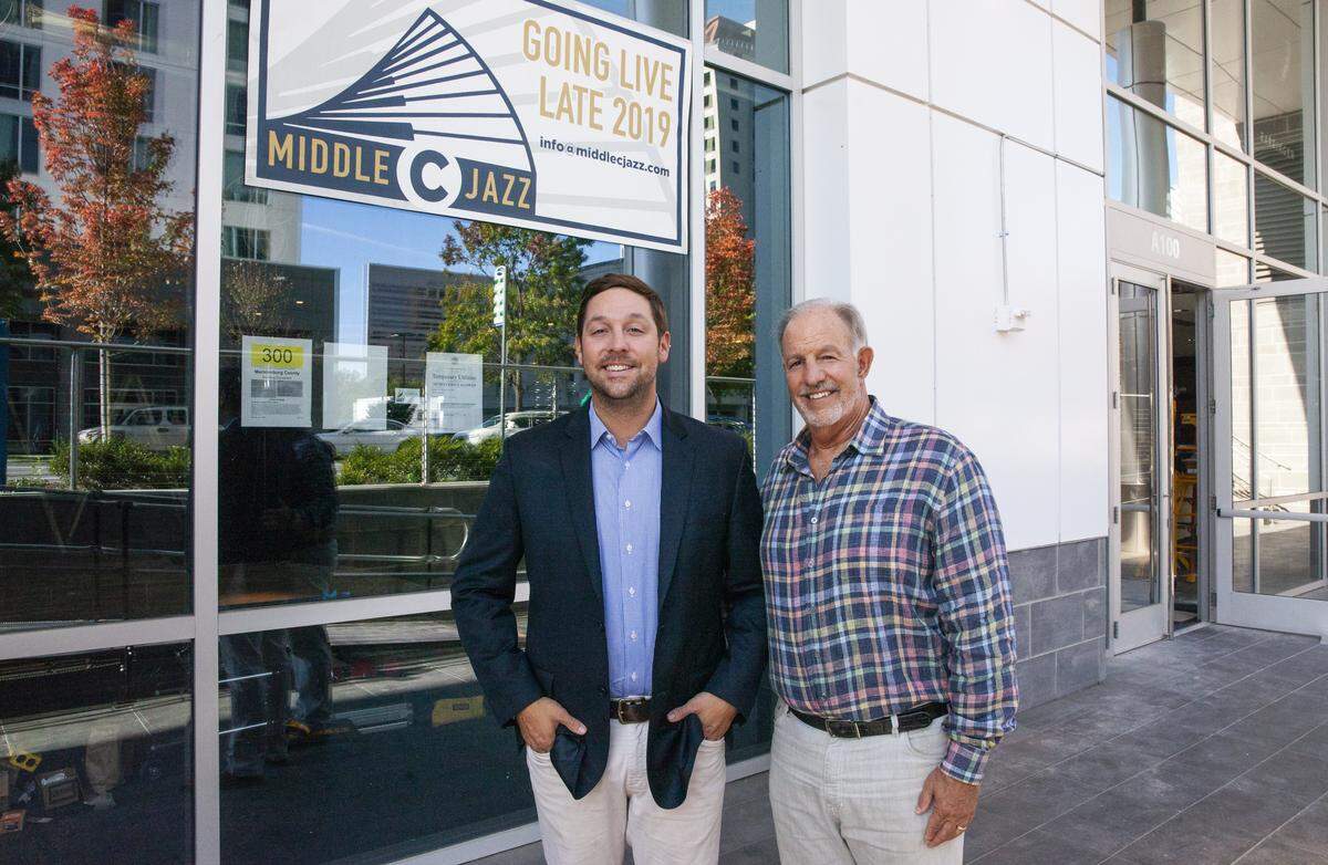Larry Farber with his son Adam Farber, who also is a partner at Middle C Jazz, photographed outside the club in 2019.