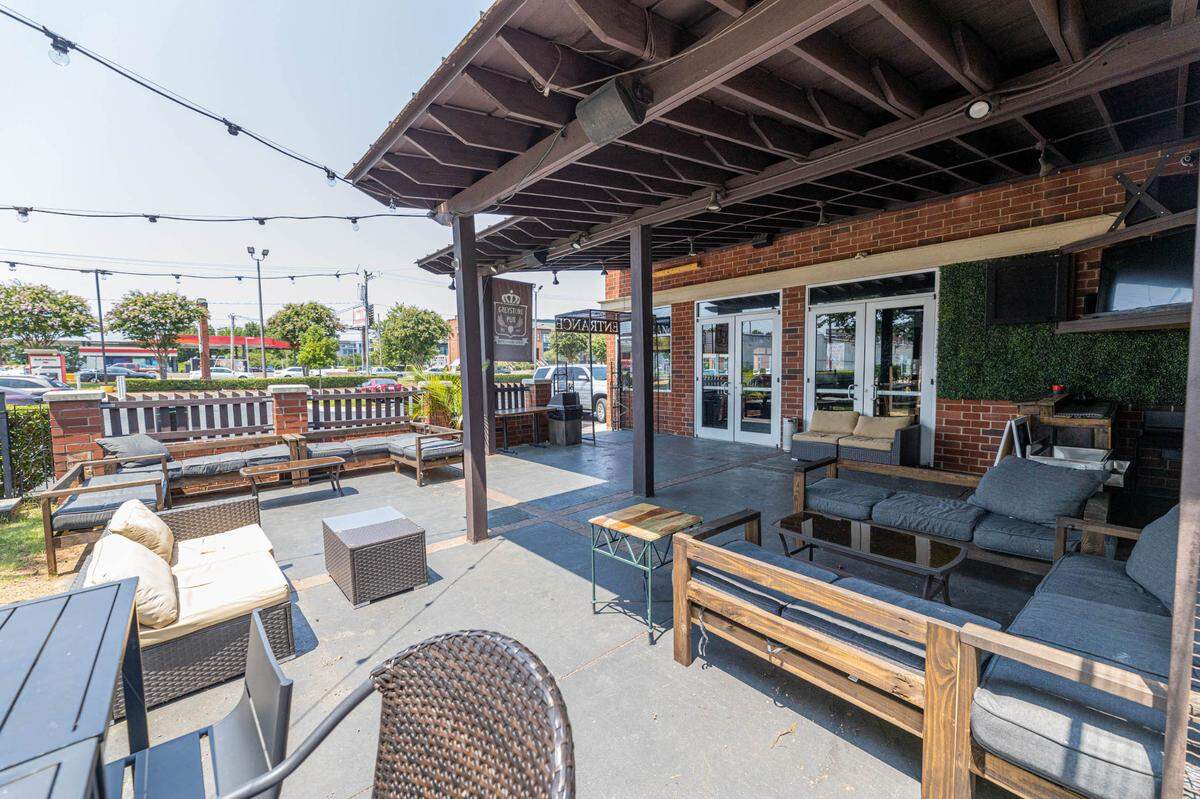 Listen to live music on the patio at The Greystone Pub.