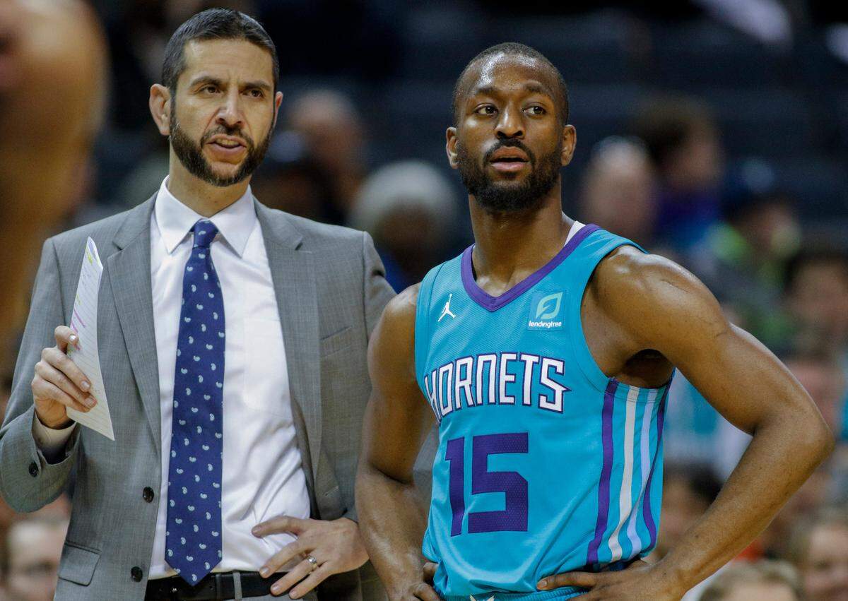 Charlotte Hornets head coach James Borrego, left, only got to coach guard Kemba Walker for a year. Walker had his best season under Borrego in 2018-19, averaging more than 25 points per game and making third-team All-NBA.