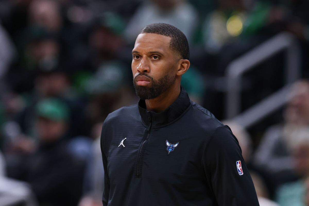 Apr 13, 2025; Boston, Massachusetts, USA; Charlotte Hornets head coach Charles Lee reacts during the first half against the Boston Celtics at TD Garden. Mandatory Credit: Paul Rutherford-Imagn Images