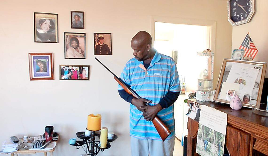 Keith Bailey, who lives near Catherine Simmons Avenue, uses his grandfather’s shotgun to patrol his yard at night. Bailey has run off drug dealers and addicts from his property.