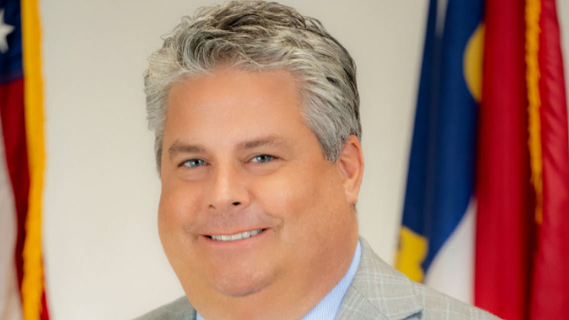 Mooresville Mayor Chris Carney called claims in a lawsuit that he was pantless with a woman at town hall “sensational.”