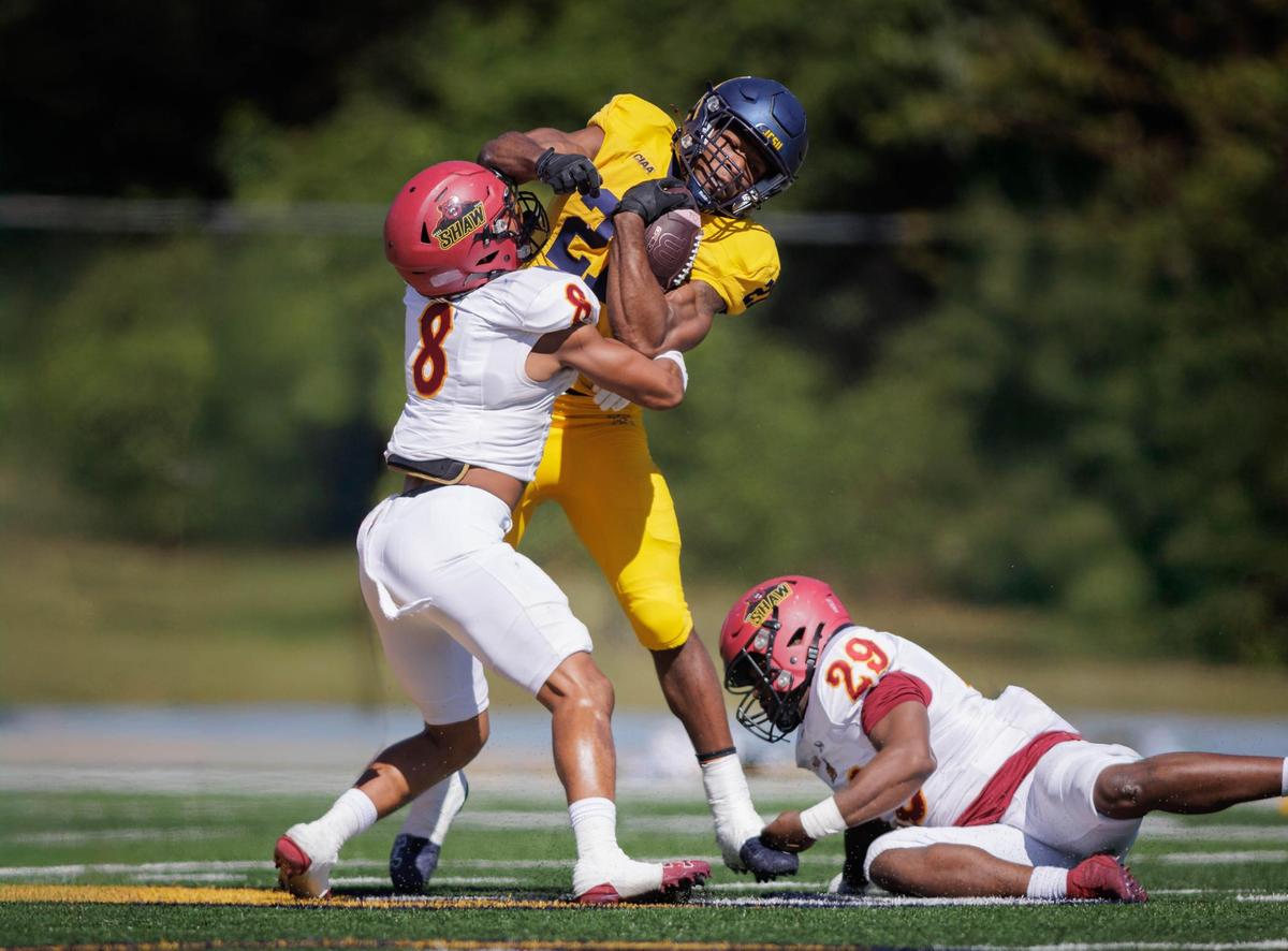 The Bulls Quavaris Crouch (center) runs for the 1st down. The Bulls go to 7-0 as they defeat Shaw University 21-14 Saturday October 19, 2024.