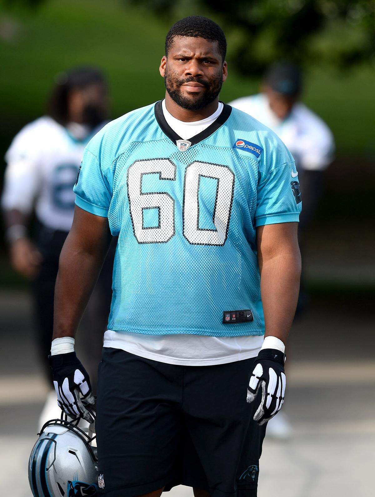 Carolina Panthers tackle Daryl Williams , shown in a file photo, returned to practice on Sunday after missing time with a torn MCL and dislocated patella, but rushing him back to play in the season opener against Dallas would be a big risk.