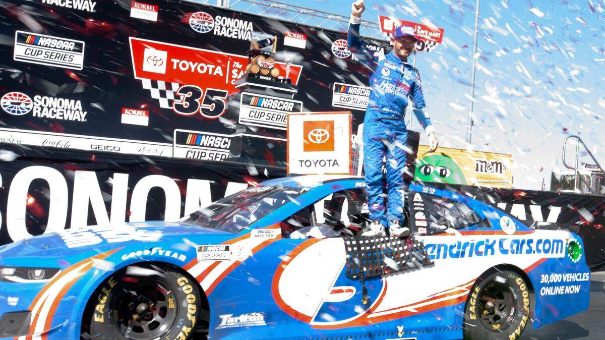 Kyle Larson stands atop his car after winning a NASCAR Cup Series race, Sunday, June 6, 2021, at Sonoma Raceway in Sonoma, Calif. (AP Photo/D. Ross Cameron)