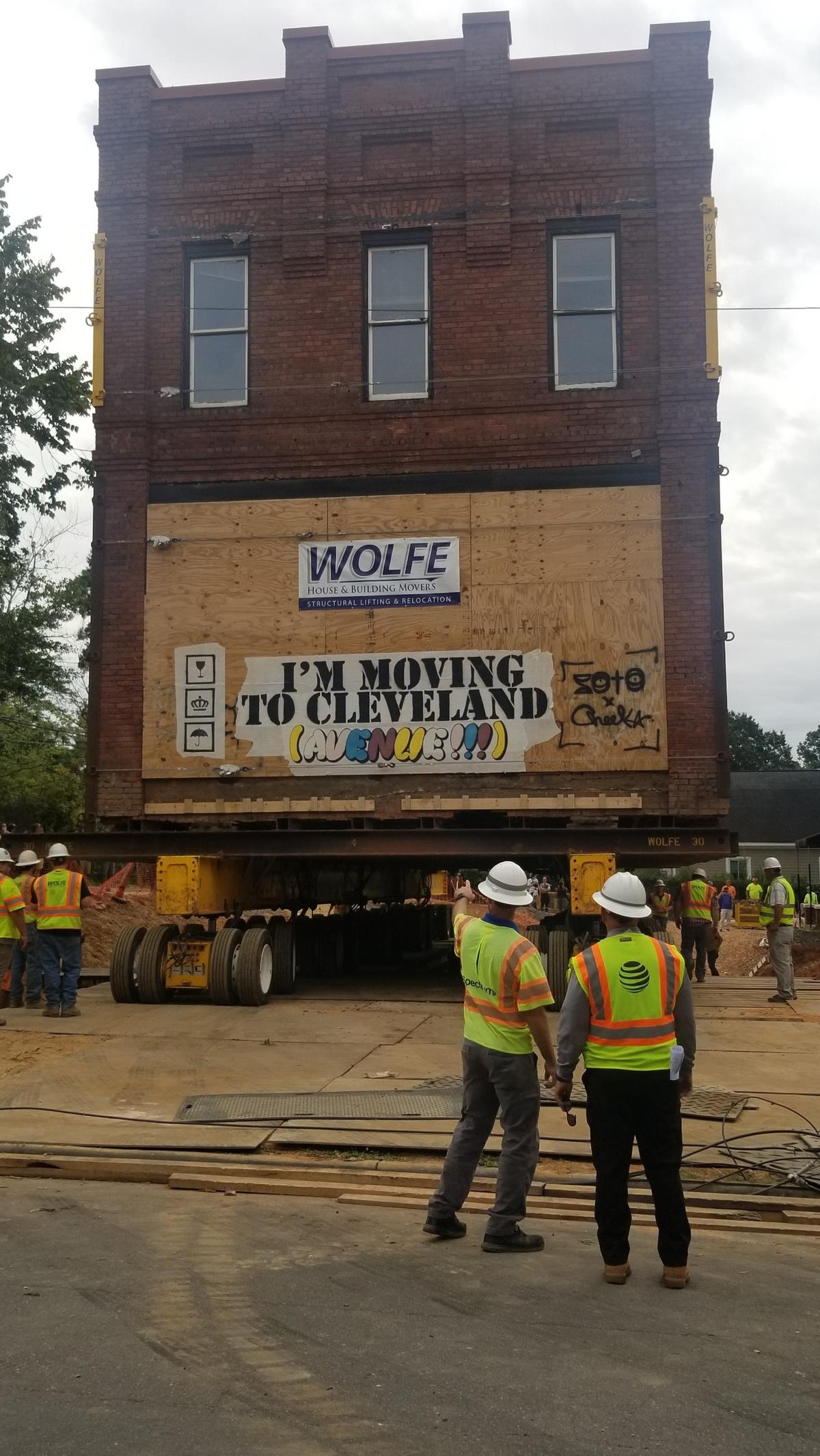 Construction crews move the historic Leeper & Wyatt building in Charlotte.