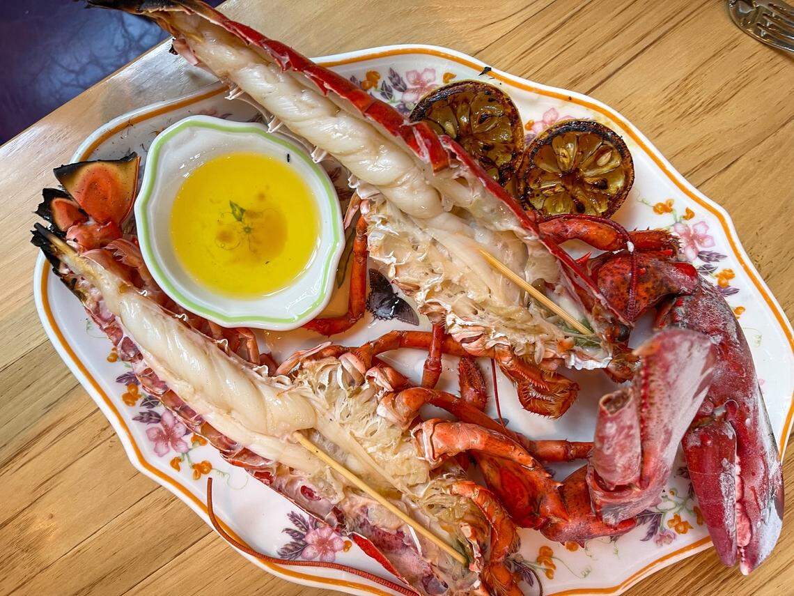 Supperland serves a grilled lobster, a two-pound whole lobster with miso-drawn butter and grilled lemon.